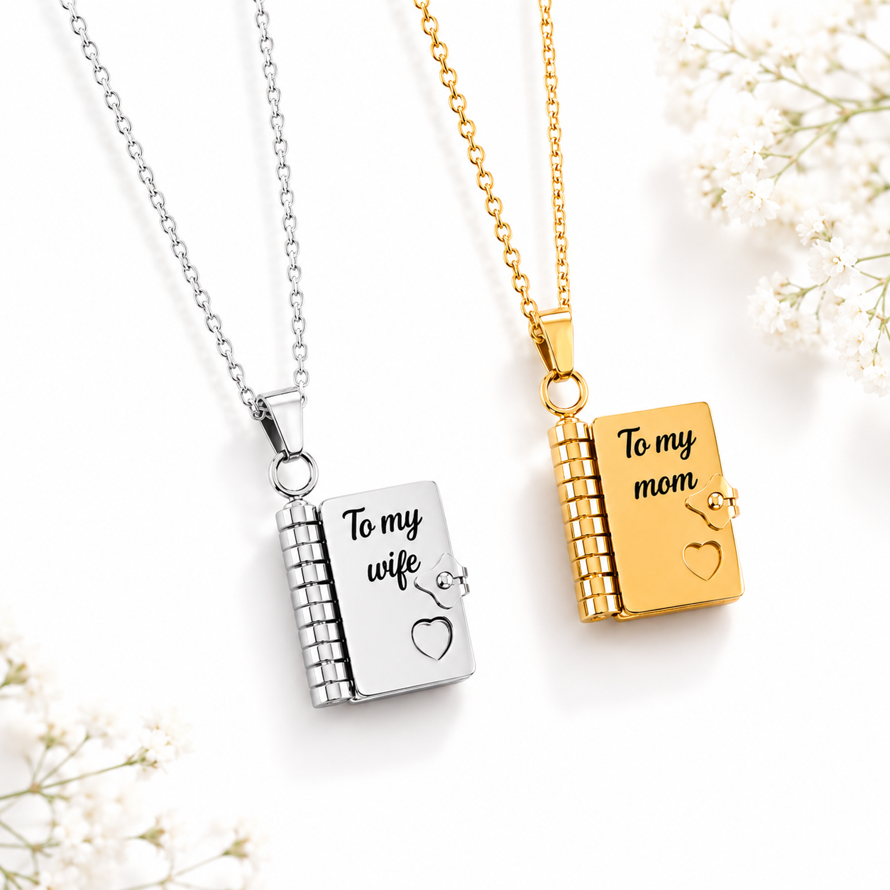 Two necklaces, one silver and one gold, with engraved text on a white background.